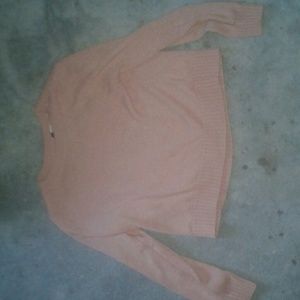 A pink sweater crop top